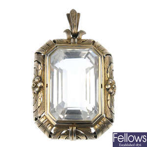 An early 20th century silver gilt rock crystal pendant