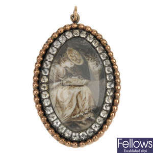 A mid 19th century gold ivory paste sentimental pendant. 