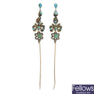 A pair of early 20th century turquoise and enamel pins, converted from ear pendants.