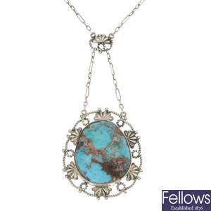 An early 20th century silver turquoise pendant.
