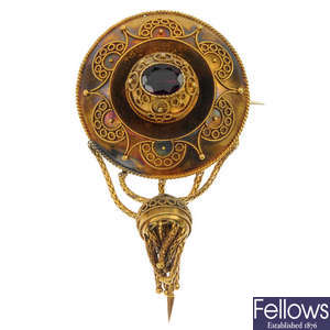A late 19th century gold foil-back garnet brooch. 