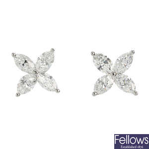 TIFFANY & CO. - a pair of platinum 'Victoria' diamond ear-studs.