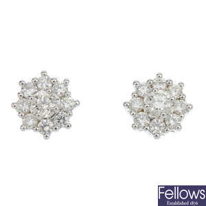 A pair of 18ct gold diamond cluster ear studs.