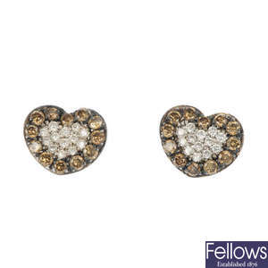 A pair of 18ct gold diamond and 'brown' diamond ear studs.