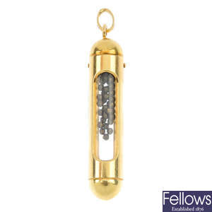 An 18ct gold sporting souvenir phial pendant.