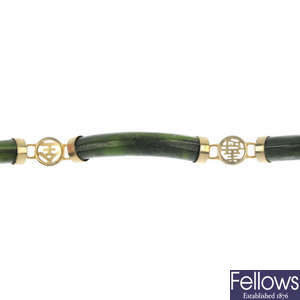 A nephrite jade bracelet, cultured pearl necklace, gold dress stud and micro mosaic bracelet.