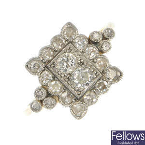 A mid 20th century platinum and 18ct gold diamond dress ring.