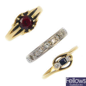 A selection of three 18ct gold gem-set dress rings.