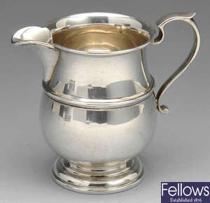A 1920's silver cream jug.