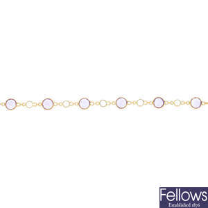 An 18ct gold amethyst and topaz bracelet.