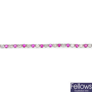 An 18ct gold ruby and diamond bracelet.
