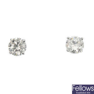 A pair of 9ct gold brilliant-cut diamond ear studs. 