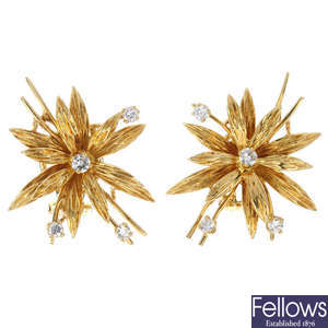 A pair of 18ct gold diamond floral ear clips.