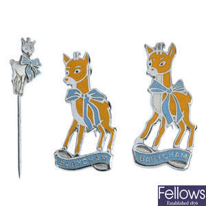 BABYCHAM - two enamel brooches and a stickpin.
