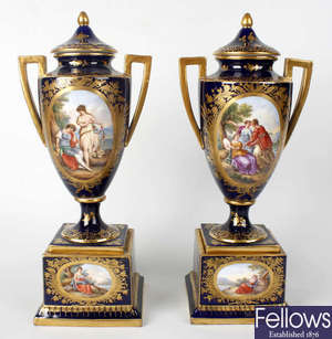 A pair of late 19th century Austrian Vienna porcelain urns