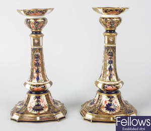 A pair of Royal Crown Derby candlesticks
