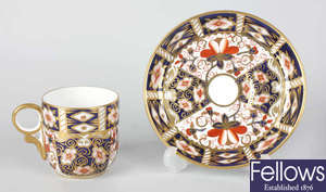 A set of twelve early 20th century Royal Crown Derby tea cups and coffee cans with saucers
