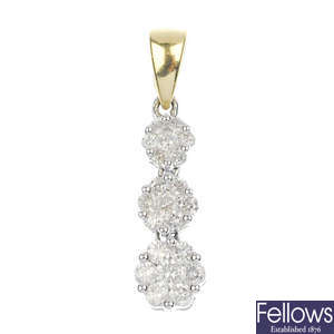 An 18ct gold diamond triple cluster pendant.