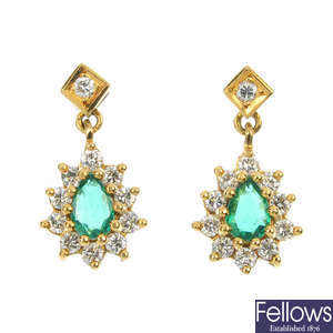 A pair of 18ct gold emerald and diamond ear pendants.