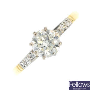 An early 20th century platinum and 18ct gold diamond single-stone ring.