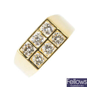 An 18ct gold diamond six-stone ring.