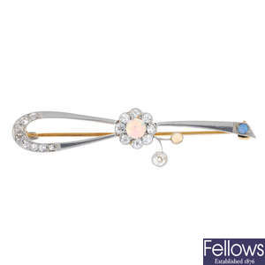 An early 20th century platinum and 18ct gold opal and diamond brooch.
