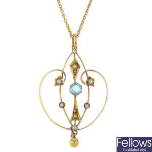 An early 20th century 9ct gold split pearl and paste pendant.
