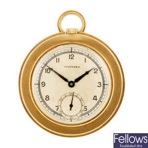 An open face pocket watch by Tavannes with an open face pocket watch and an Oris pocket watch.