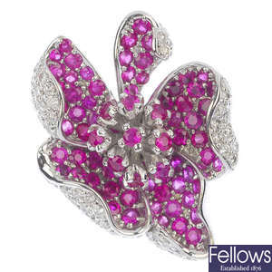 A 14ct gold ruby and diamond floral ring.