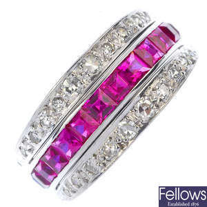 A diamond, synthetic sapphire and synthetic ruby hinged flip ring.