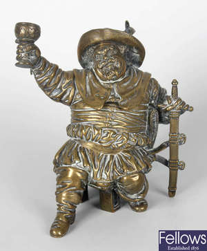 A 19th century cast brass figural inkwell