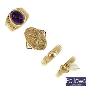 A selection of 9ct gold rings. 
