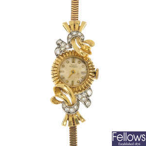 A lady's 18ct gold and diamond manual wind Girard Perregaux bracelet watch.