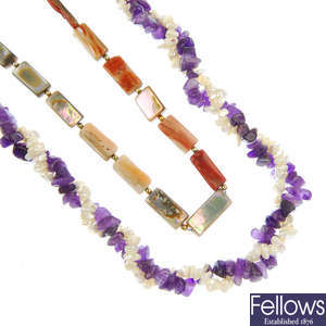 A selection of seven gem necklaces and two bracelets.