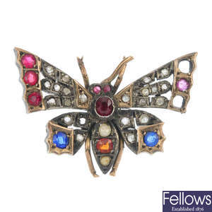 A late Victorian silver and gold diamond and gem-set butterfly brooch, circa 1880.