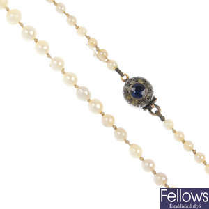 A cultured pearl single-strand necklace, with paste clasp.