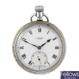 An open face military issue pocket watch by J.W Benson.