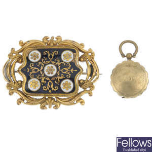 A selection of mourning jewellery to include a gold enamel brooch.