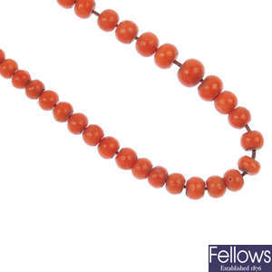 Two coral bead necklaces.
