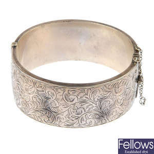A selection of five silver bangles