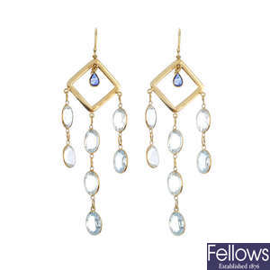 A pair of gem-set ear pendants.