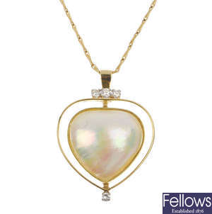 An 18ct gold mabe pearl and diamond pendant.