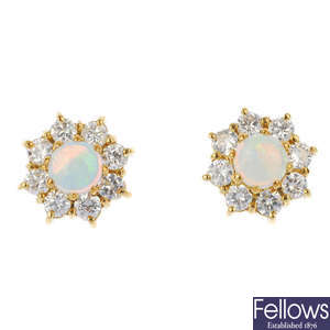A pair of 18ct gold opal and diamond cluster ear studs.