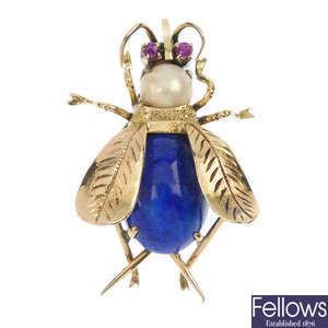 A dyed lapis lazuli, ruby and cultured pearl fly brooch.