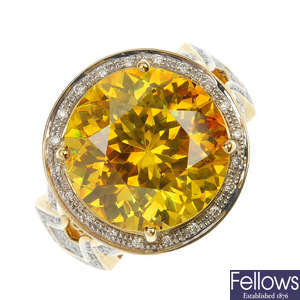 An 18ct gold gem-set cluster ring. 
