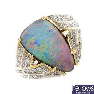 An 18ct gold boulder opal and diamond ring.