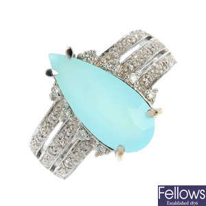 An 18ct gold chalcedony and diamond dress ring.