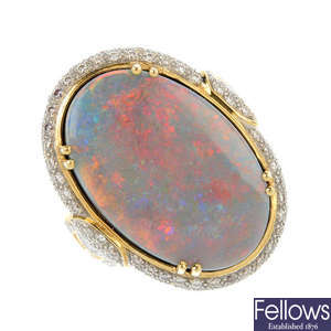 A 18ct gold treated opal and diamond ring.