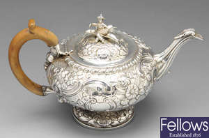 A George II silver bachelor teapot.