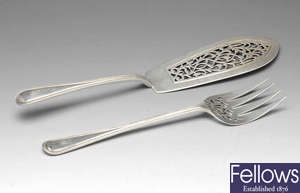 A pair of Victorian silver fish servers.